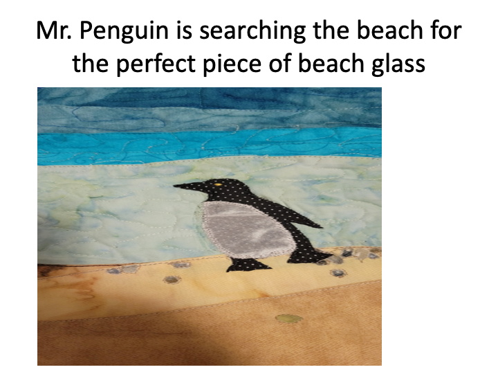 Mr Penguin is searching the beach for the perfect piece of beach glass