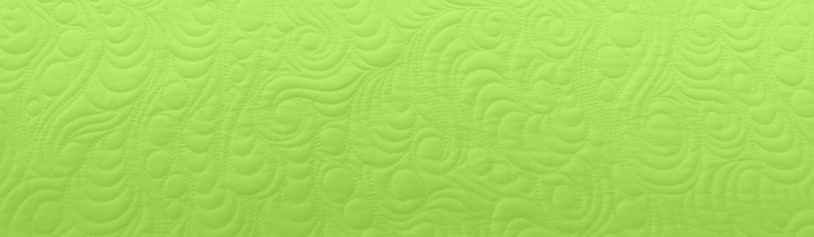 Texture of quilting on a spring bud background
