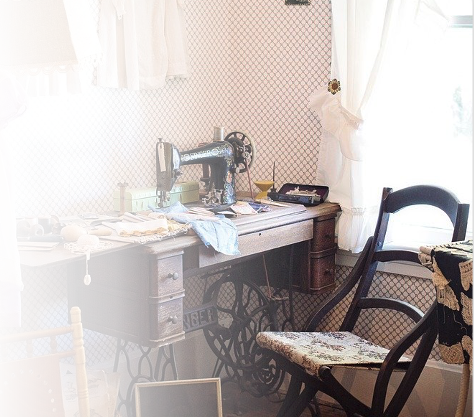Photo of vintage sewing space and antique sewing machine